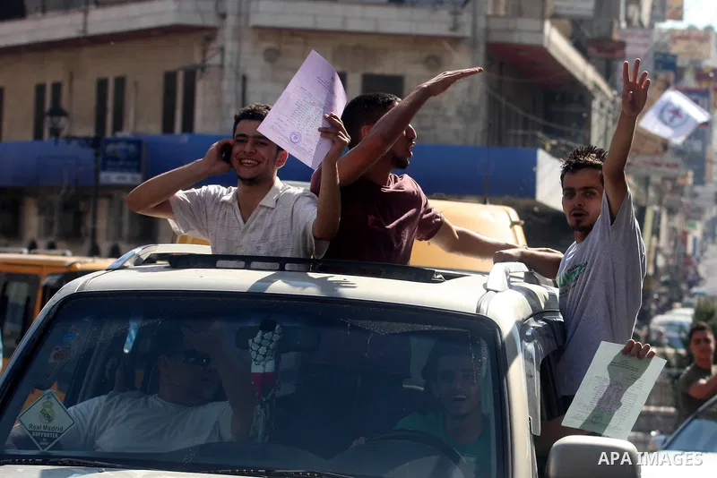 Palestinian high school student celebrated after hearing the results of their final exams known as "Tawjihi" in the West Bank city of Ramallah on July 19, 2012. The Ministry of Education in Gaza Strip and the West Bank a...