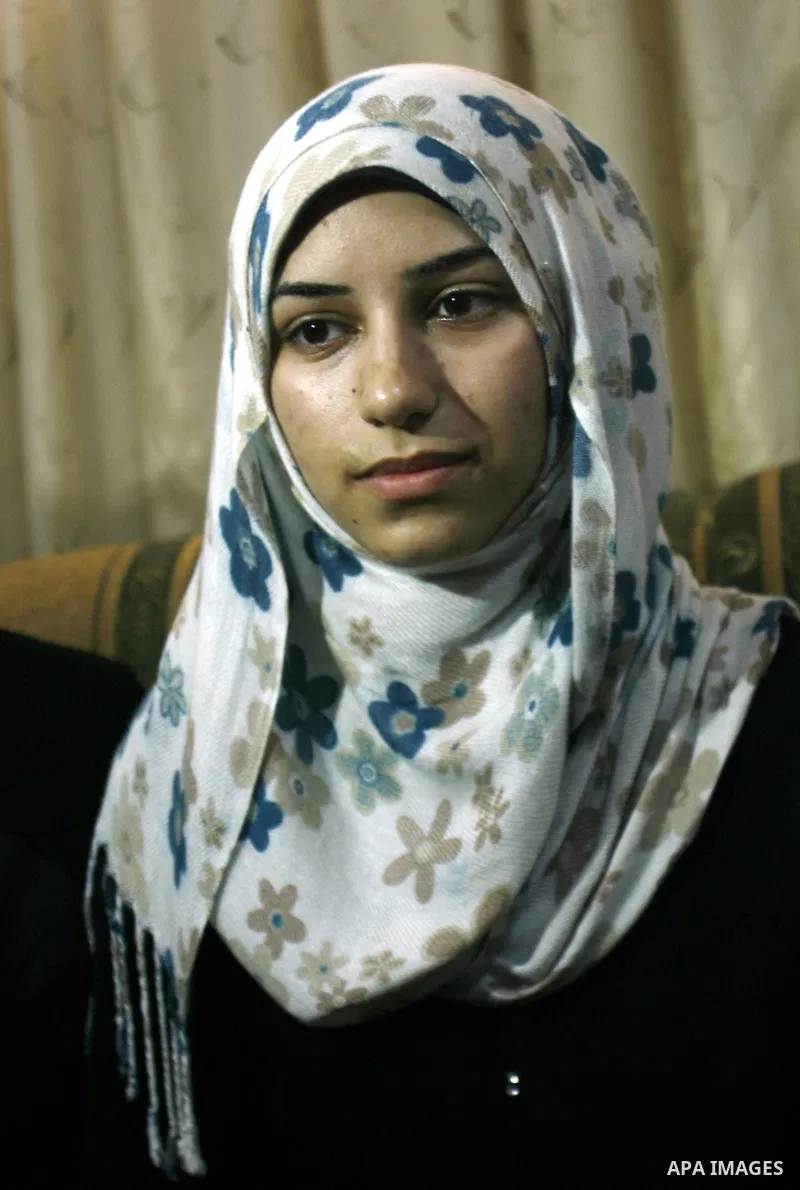A Palestinian high school student, Nourhan Abu Obaid celebrates with her family after heard the results of her final exams known as "Tawjihi" in Rafah refugee camp southern Gaza strip, on July 19, 2012. The Ministry of E...