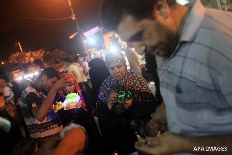A Palestinian muslim Family buy electric lights for the month of Ramadan, in preparation for the muslim holy month, at the old market on 19 July 2012 in gaza city. Ramadan is the ninth month of the Islamic calender, a mo...