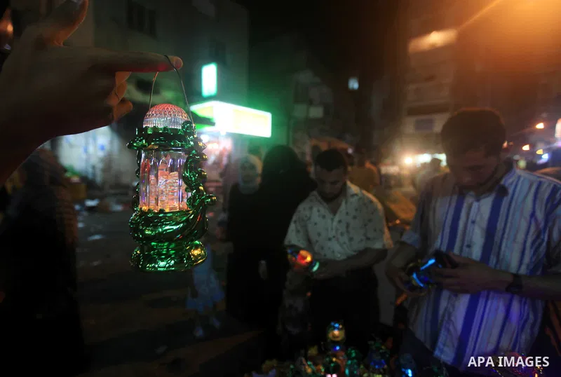 A Palestinian muslim Family buy electric lights for the month of Ramadan, in preparation for the muslim holy month, at the old market on 19 July 2012 in gaza city. Ramadan is the ninth month of the Islamic calender, a mo...