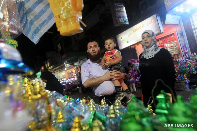 A Palestinian muslim Family buy electric lights for the month of Ramadan, in preparation for the muslim holy month, at the old market on 19 July 2012 in gaza city. Ramadan is the ninth month of the Islamic calender, a mo...