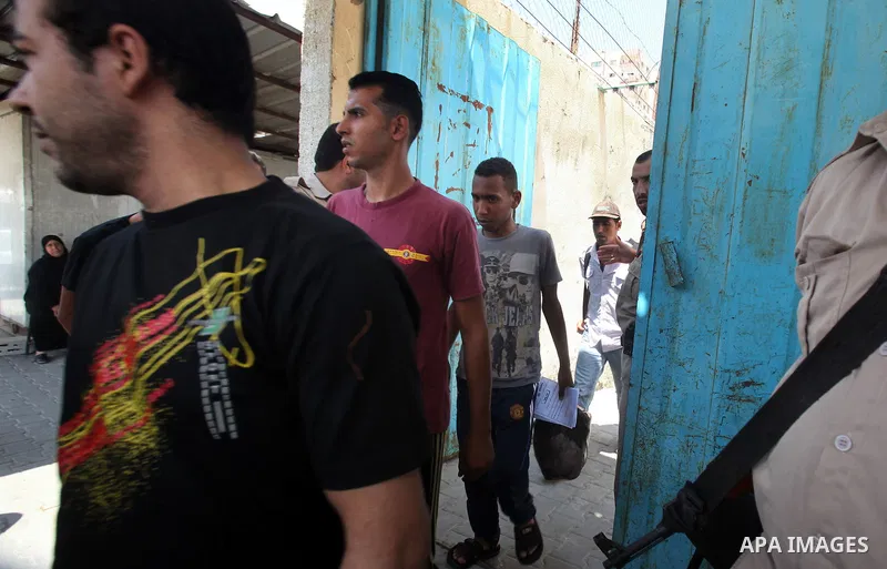 Palestinian prisoners prepare to be freed from a Hamas-run jail in Gaza City on July 21, 2012. Palestinian Hamas police released prisoners because of the approaching holy month of Ramadan. Photo by Yasser Fathi