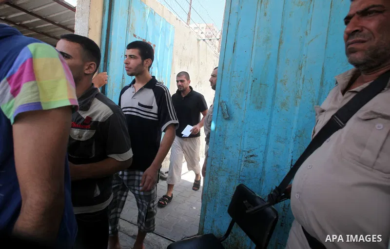 Palestinian prisoners prepare to be freed from a Hamas-run jail in Gaza City on July 21, 2012. Palestinian Hamas police released prisoners because of the approaching holy month of Ramadan. Photo by Yasser Fathi