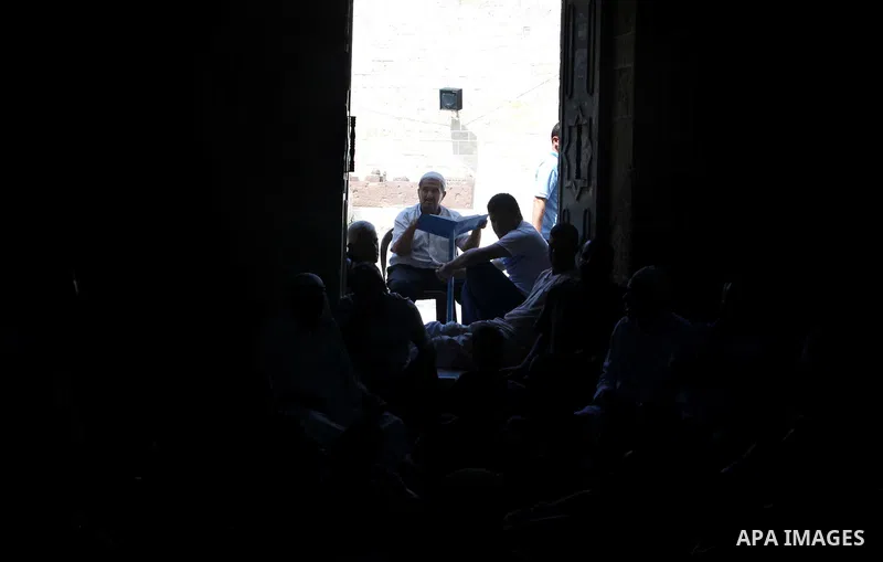 Palestinian muslims read the holy Qur'an at al-Omari mosque in Gaza city, on 21 July 2012. Muslims around the world refrain from eating, drinking and sexual intercourse from dawn till dusk during Ramadan, the holiest mon...
