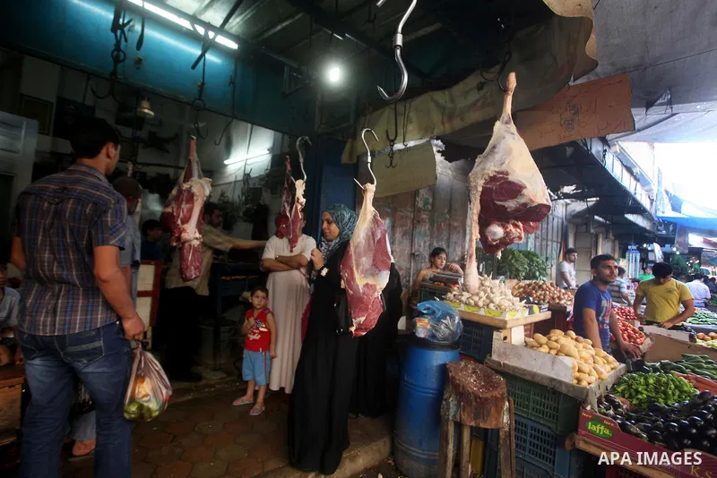Palestinians shop at the traditional market in Gaza city on the second day of the holy month of Ramadan,on 21 July 2012. Muslims around the world abstain from eating, drinking and conducting sexual relations from dawn ti...