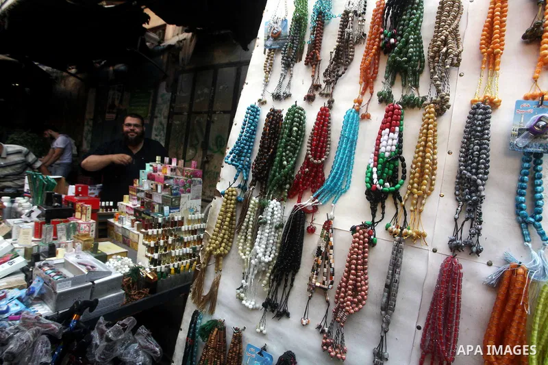 A Palestinian vendor displays goods in front of his shop in Gaza city on the second day of the holy month of Ramadan, on 21 July 2012. Muslims around the world abstain from eating, drinking and conducting sexual relation...