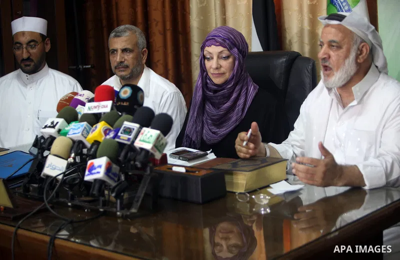 British citizen Anne Kennedy, 49, at the headquarters of the Palestinian Muslim Scholars association in Gaza city July 21, 2012 during a press conference to announcing her conversion to Islam in during the holy month of...