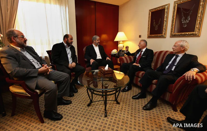 General Guide of the Egyptian Muslim Brotherhood Muhammad Badi, meets with Hamas leader Khaled Meshaal and members of Hamas in Cairo July 21, 2012. Photo by Mohammed Al-Hams