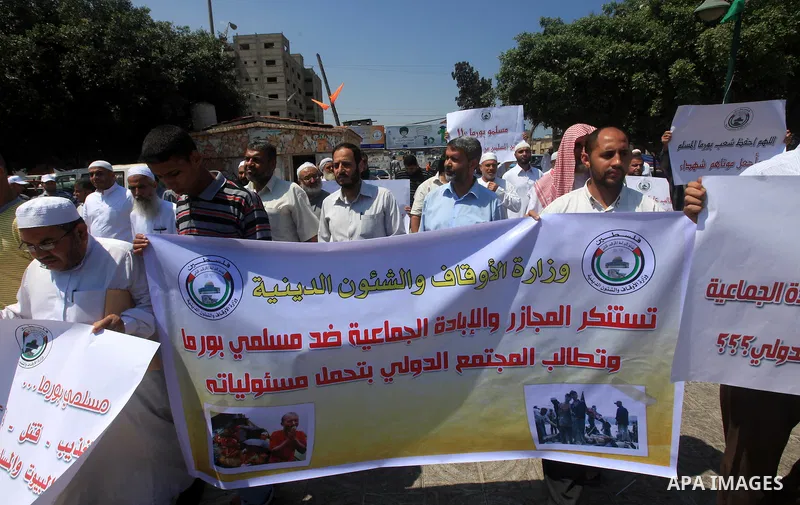 Palestinians member of the Ministry of Awqaf and Religious Affairs, during a demonstration calling to stop killing the Burmese Muslims in Myanmar, in Gaza City, July 22, 2012. Dozens of Muslims were killed and thousands...