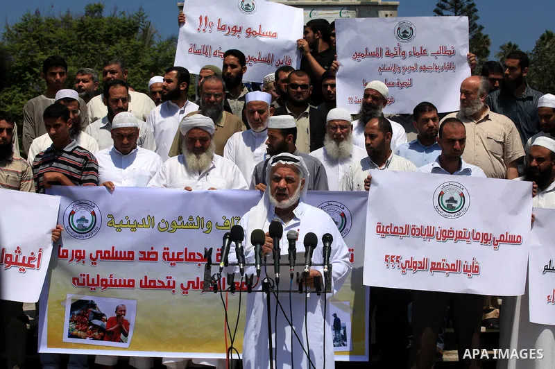 Palestinians member of the Ministry of Awqaf and Religious Affairs, during a demonstration calling to stop killing the Burmese Muslims in Myanmar, in Gaza City, July 22, 2012. Dozens of Muslims were killed and thousands...