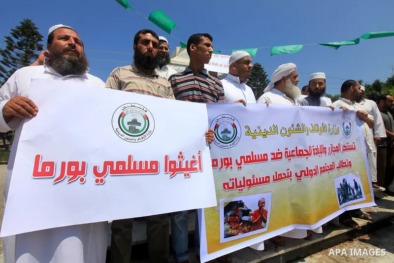 Palestinians member of the Ministry of Awqaf and Religious Affairs, during a demonstration calling to stop killing the Burmese Muslims in Myanmar, in Gaza City, July 22, 2012. Dozens of Muslims were killed and thousands...