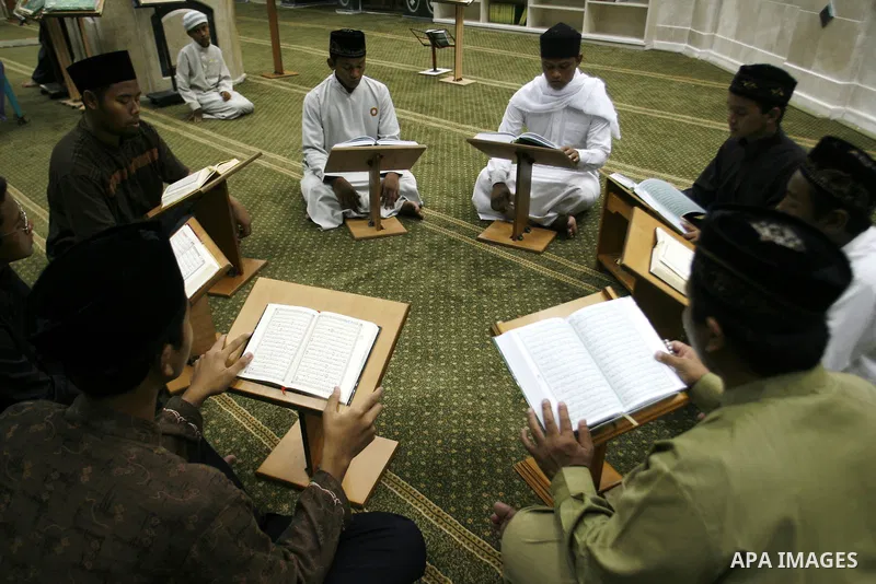 Delegation of the Indonesian read the holy Qur'an at al- Abrar mosque in Rafah in southern Gaza strip, on 22 July 2012. Muslims around the world refrain from eating, drinking and sexual intercourse from dawn till dusk du...