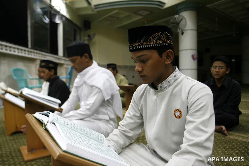 Delegation of the Indonesian read the holy Qur'an at al- Abrar mosque in Rafah in southern Gaza strip, on 22 July 2012. Muslims around the world refrain from eating, drinking and sexual intercourse from dawn till dusk du...