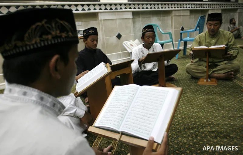 Delegation of the Indonesian read the holy Qur'an at al- Abrar mosque in Rafah in southern Gaza strip, on 22 July 2012. Muslims around the world refrain from eating, drinking and sexual intercourse from dawn till dusk du...