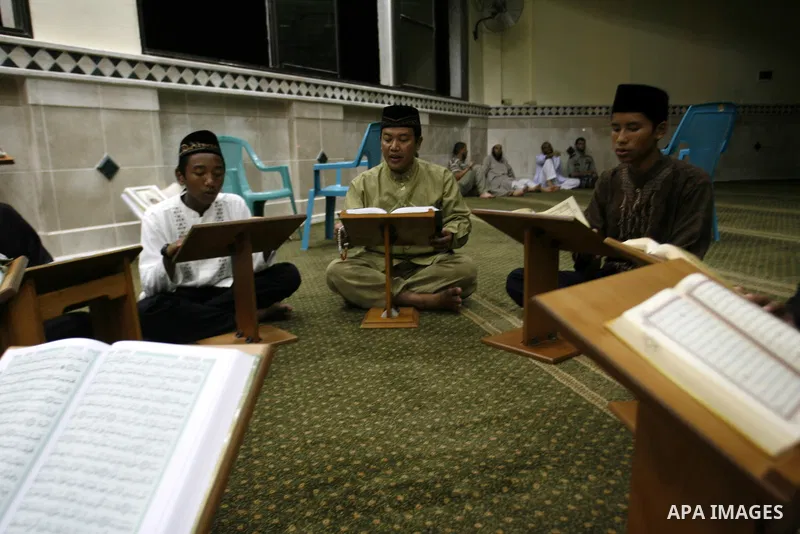 Delegation of the Indonesian read the holy Qur'an at al- Abrar mosque in Rafah in southern Gaza strip, on 22 July 2012. Muslims around the world refrain from eating, drinking and sexual intercourse from dawn till dusk du...