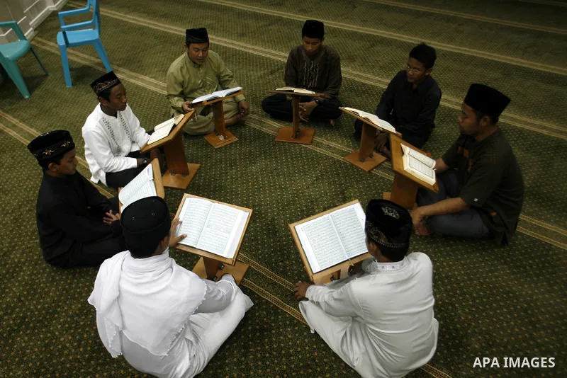 Delegation of the Indonesian read the holy Qur'an at al- Abrar mosque in Rafah in southern Gaza strip, on 22 July 2012. Muslims around the world refrain from eating, drinking and sexual intercourse from dawn till dusk du...