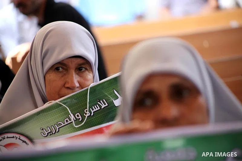Palestinian relatives prisoners attend a protest calling for the release of their sons held in Israeli jails in front of the headquarters Red Cross in Gaza City, Gaza Strip, on July.23, 2012. Photo by Ashraf Amra