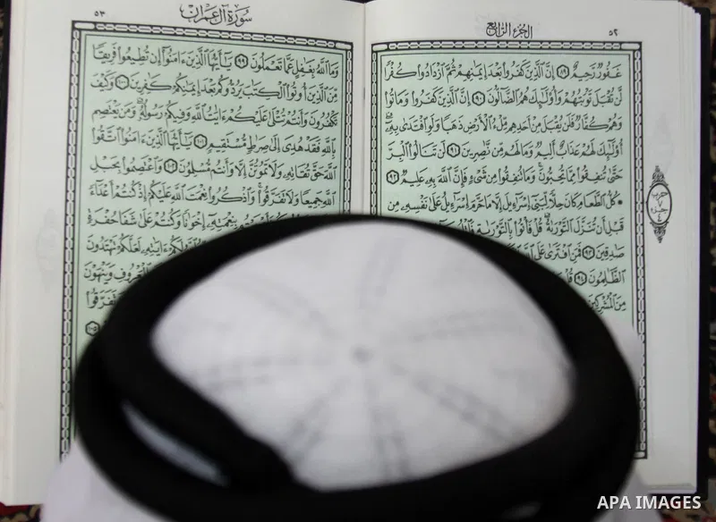 Palestinians read the holy Qur'an at the mosque in West Bank City of Nablus, on 23 July 2012. Muslims around the world refrain from eating, drinking and sexual intercourse from dawn till dusk during Ramadan, the holiest...