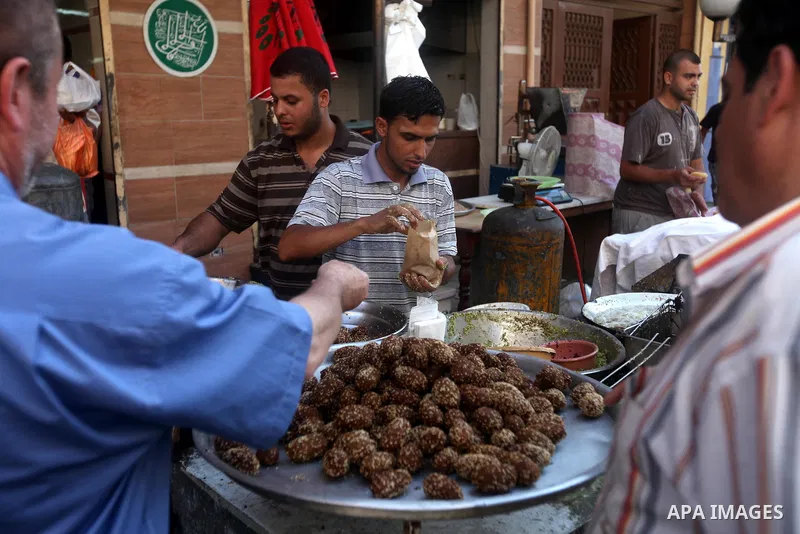 A Palestinian man prepares traditional Falafel during Ramadan in Gaza city, on July 23, 2012. Muslims around the world abstain from eating, drinking and conducting sexual relations from dawn till dusk during Ramadan, the...