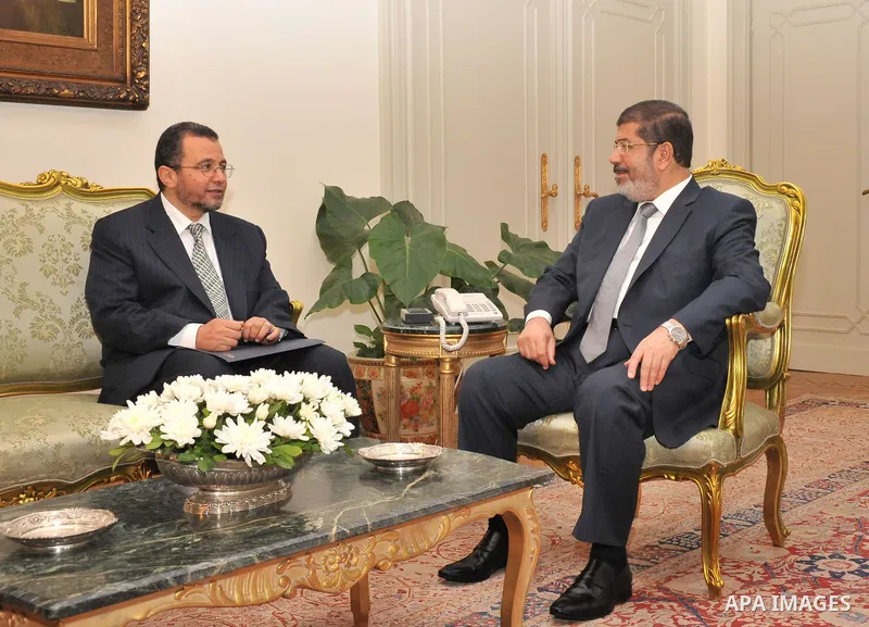 Egyptian President Mohamed Morsi (R) meeting with the newly nominated Prime Minister Hisham Qandil, at the presidential palace, in Cairo, Egypt, 25 July 2012. Egyptian President Mohammed Morsi named the country's new Pri...