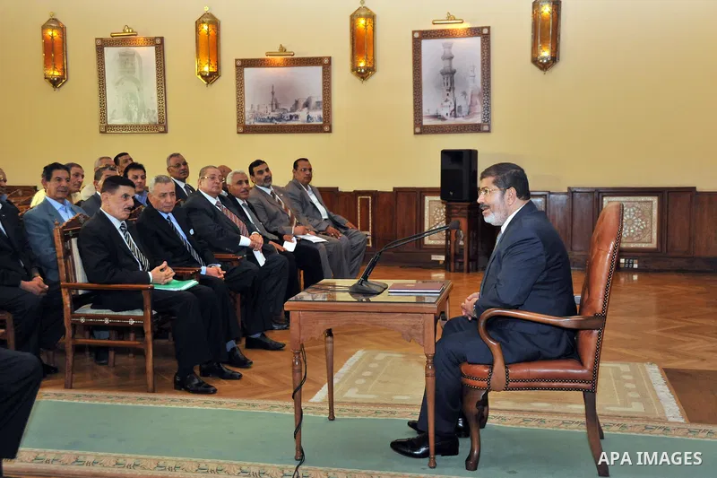 Egyptian President Mohamed Morsi delivering a speech to the Egyptian Labour and Union representatives at the Presidential Palace in Cairo, on July 25, 2012. Photo by Ahmed Fouad \ EGYPTIAN PRESIDENCY