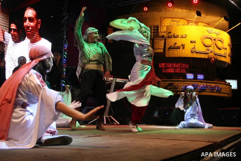 Palestinians celebrate of the opening Olympics Games in London, on July 27, 2012, in the West Bank city of Ramallah. Photo by Issam Rimawi