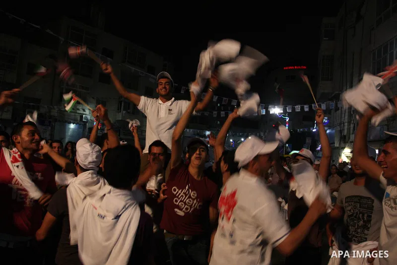 Palestinians celebrate of the opening Olympics Games in London, on July 27, 2012, in the West Bank city of Ramallah. Photo by Issam Rimawi
