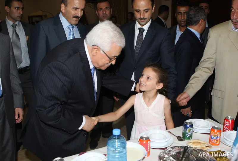 Palestinian President Mahmoud Abbas (Abu Mazen) breaks with the elderly and blind in the West Bank city of Jenin on July 28, 2012. Photo by Thaer Ganaim