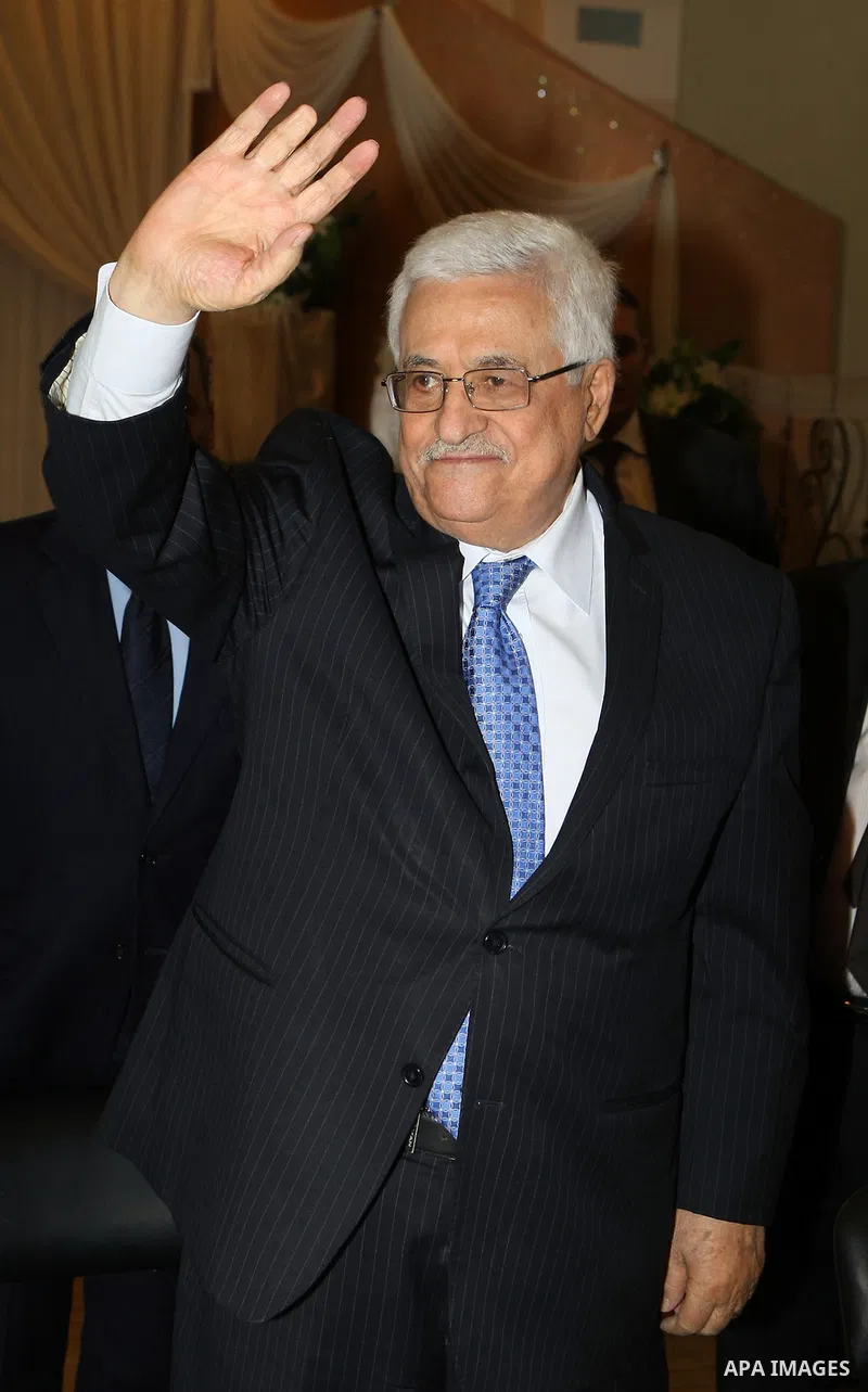 Palestinian President Mahmoud Abbas (Abu Mazen) breaks with the elderly and blind in the West Bank city of Jenin on July 28, 2012. Photo by Thaer Ganaim