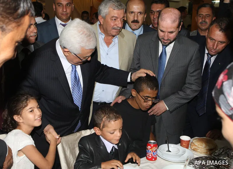 Palestinian President Mahmoud Abbas (Abu Mazen) breaks with the elderly and blind in the West Bank city of Jenin on July 28, 2012. Photo by Thaer Ganaim