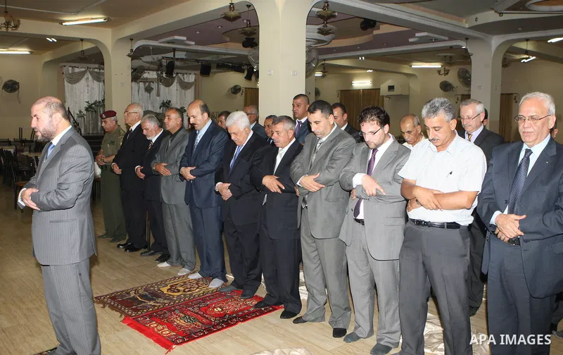Palestinian President Mahmoud Abbas (Abu Mazen) during pray the Maghrib in the West Bank city of Jenin on July 28, 2012 . Photo by Thaer Ganaim