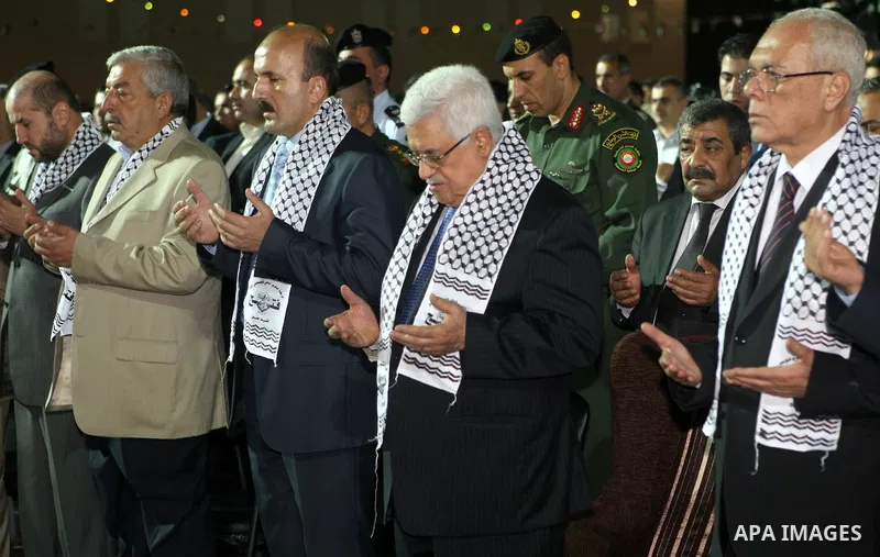 Palestinian President Mahmoud Abbas (Abu Mazen) participates in a graduation ceremony for outstanding students in the West Bank city of Jenin on July 28, 2012. Photo by Thaer Ganaim