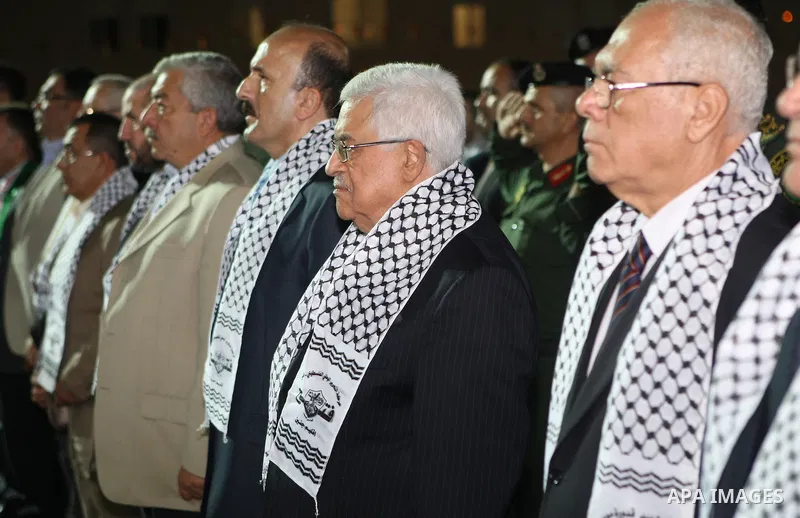 Palestinian President Mahmoud Abbas (Abu Mazen) participates in a graduation ceremony for outstanding students in the West Bank city of Jenin on July 28, 2012. Photo by Thaer Ganaim