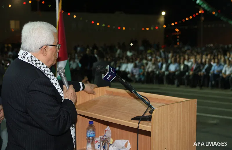 Palestinian President Mahmoud Abbas (Abu Mazen) participates in a graduation ceremony for outstanding students in the West Bank city of Jenin on July 28, 2012. Photo by Thaer Ganaim