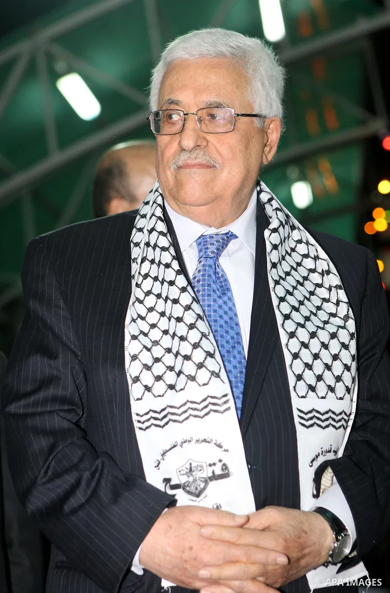 Palestinian President Mahmoud Abbas (Abu Mazen) participates in a graduation ceremony for outstanding students in the West Bank city of Jenin on July 28, 2012. Photo by Thaer Ganaim