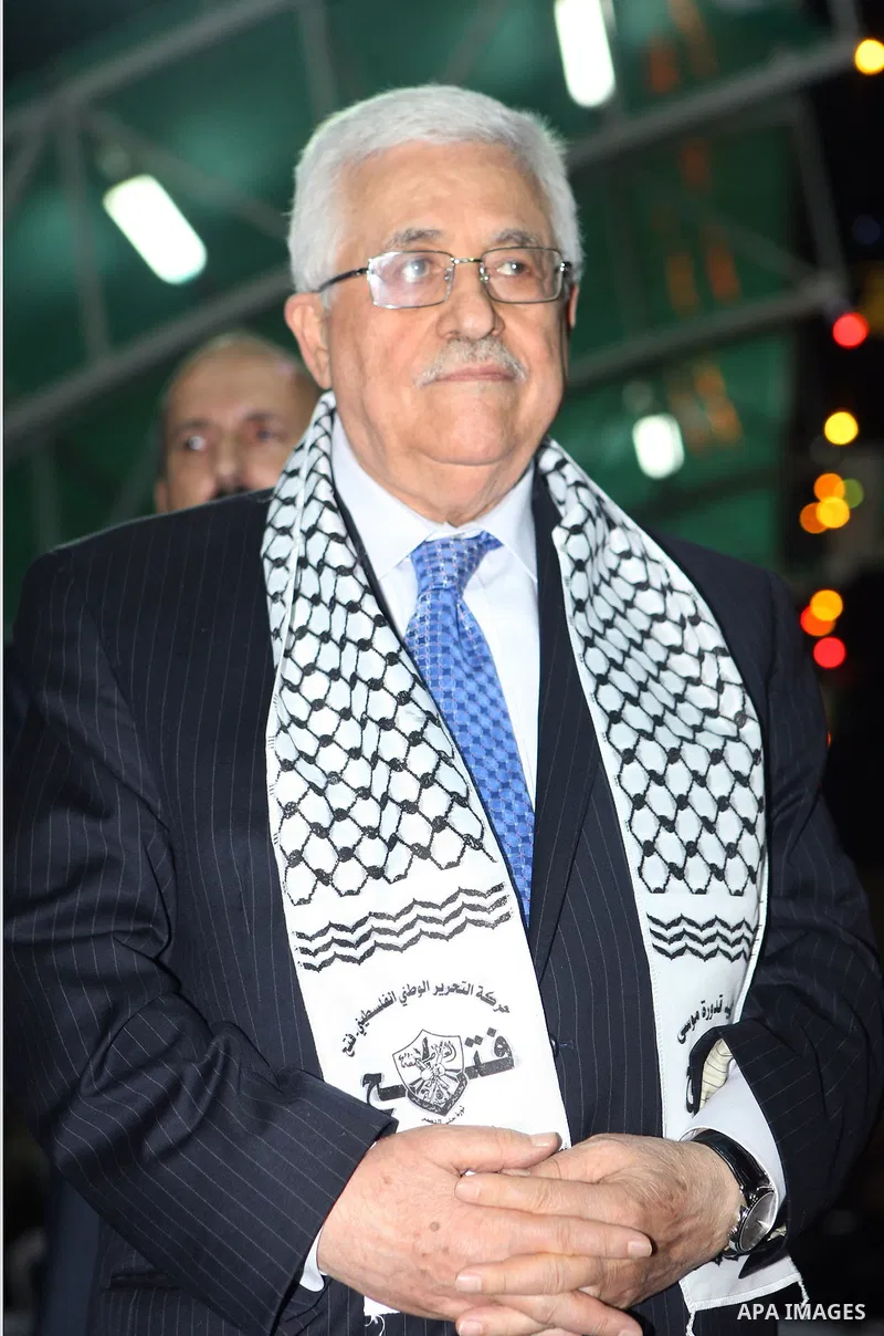 Palestinian President Mahmoud Abbas (Abu Mazen) participates in a graduation ceremony for outstanding students in the West Bank city of Jenin on July 28, 2012. Photo by Thaer Ganaim