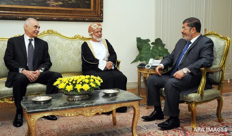 Egyptian President Mohamed Morsi (R) meets with Foreign Minister of Oman Yusuf bin Alawi (2-R)) with the presence of Egyptian Foreign Minister Mohammed Kamel Amr (L) at the presidential palace, in Cairo, Egypt, 29 July 2...