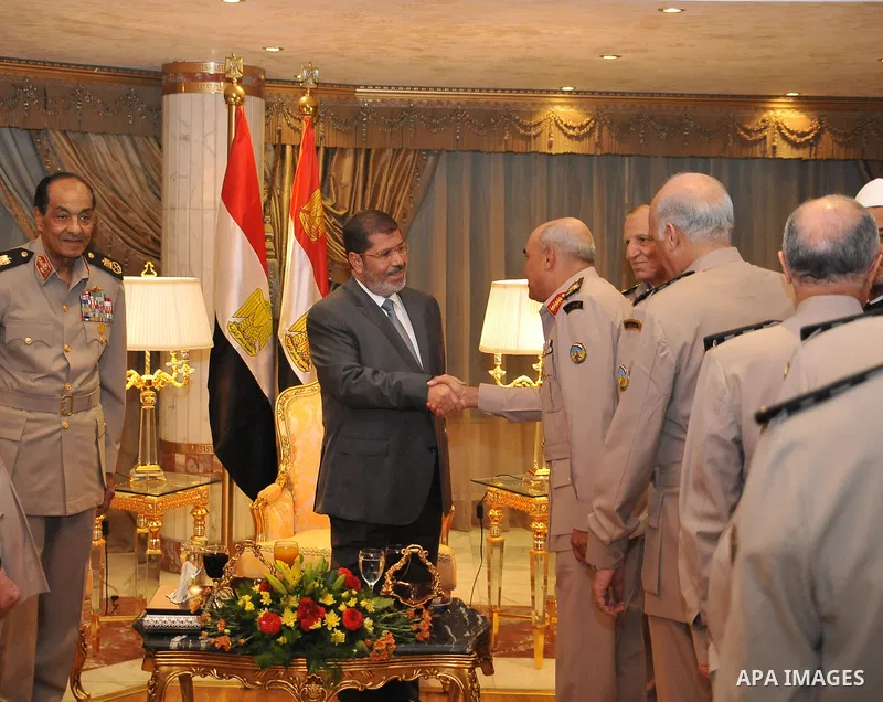 President Mohamed Morsi, participates in ceremony breakfast with Leaders of the armed forces in club Al Jalaa' in Cairo on July 30, 2012. Photo by EGYPTIAN PRESIDENCY
