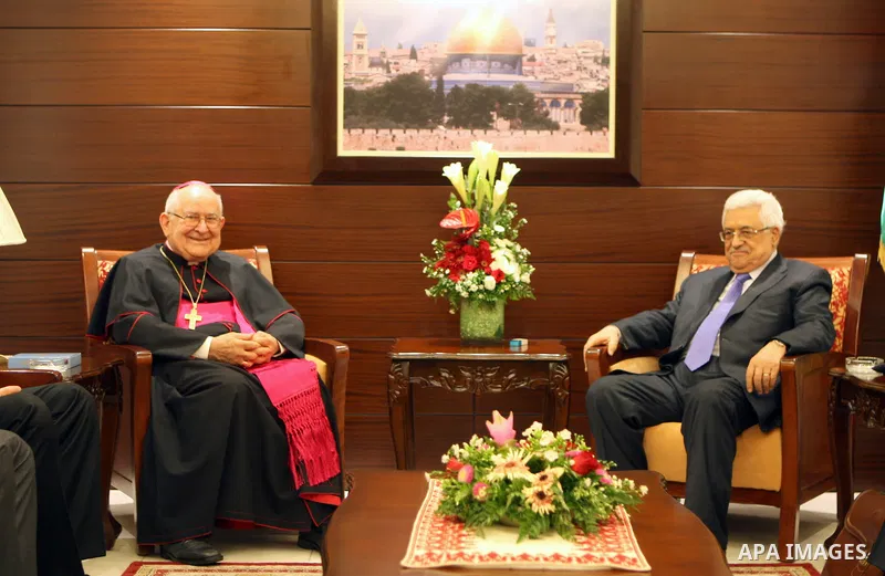 Palestinian President Mahmoud Abbas (Abu Mazen) meets with President of the Pontifical Mission in the West Bank city of Ramallah, on 02 August 2012. Photo by Thaer Ganaim