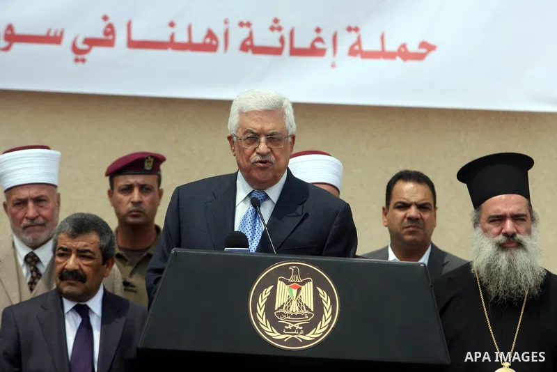 Palestinian President Mahmoud Abbas speaks to the media during a press event in the West Bank city of Ramallah August 5, 2012. An aid convoy left Ramallah on Sunday carrying food and medicine in a symbol of support for P...