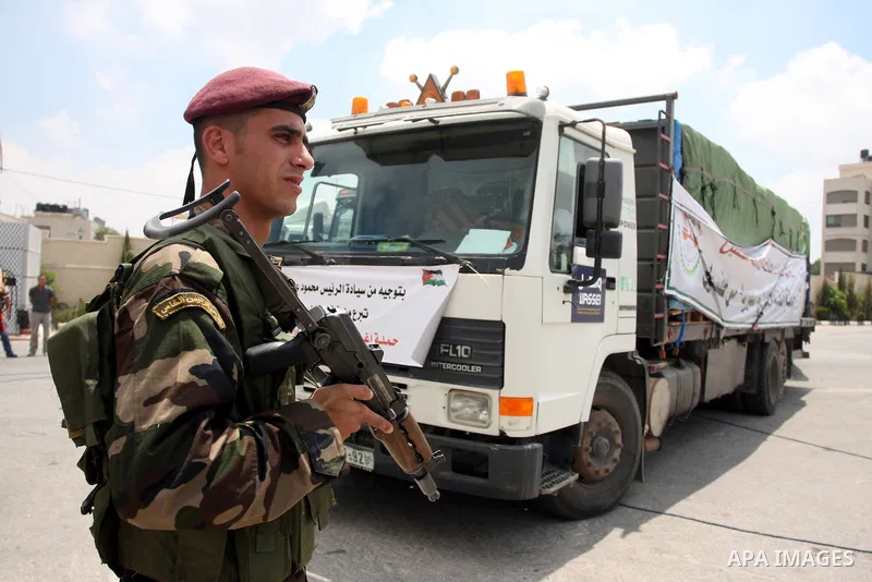 Palestinian trucks carrying food and medical supplies, which reportedly were provided by the Palestinian people, for a convoy ready to leave Ramallah bound for Syria, in Ramallah, West Bank, 05 August 2012. The convoy of...
