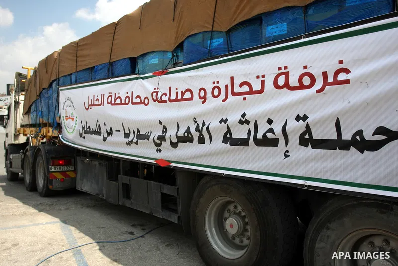 Palestinian trucks carrying food and medical supplies, which reportedly were provided by the Palestinian people, for a convoy ready to leave Ramallah bound for Syria, in Ramallah, West Bank, 05 August 2012. The convoy of...