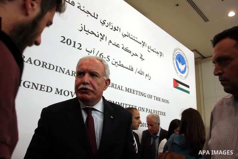 Palestinian foreign minister Riad al-Malki speaks to the press in the West Bank city of Ramallah on August 5, 2012, as Non-Aligned Movement (NAM) ministers gather in the neighboring Jordanian capital Amman to take part i...