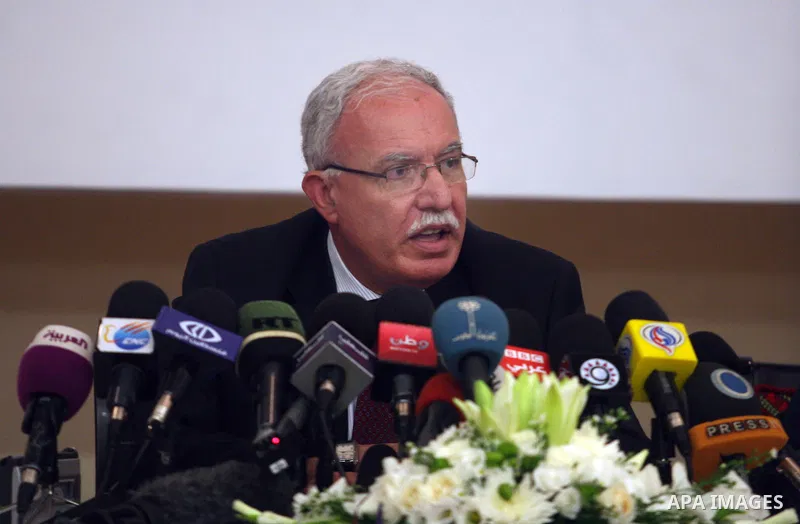 Palestinian foreign minister Riad al-Malki speaks to the press in the West Bank city of Ramallah on August 5, 2012, as Non-Aligned Movement (NAM) ministers gather in the neighboring Jordanian capital Amman to take part i...