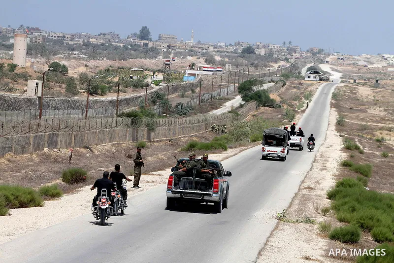 Palestinians Hamas security guard on duty on the border between Egypt and Gaza strip in Rafah town southern Gaza strip on, 06 August 2012. Reports state that at least five gunmen were killed after they tried to infiltrat...