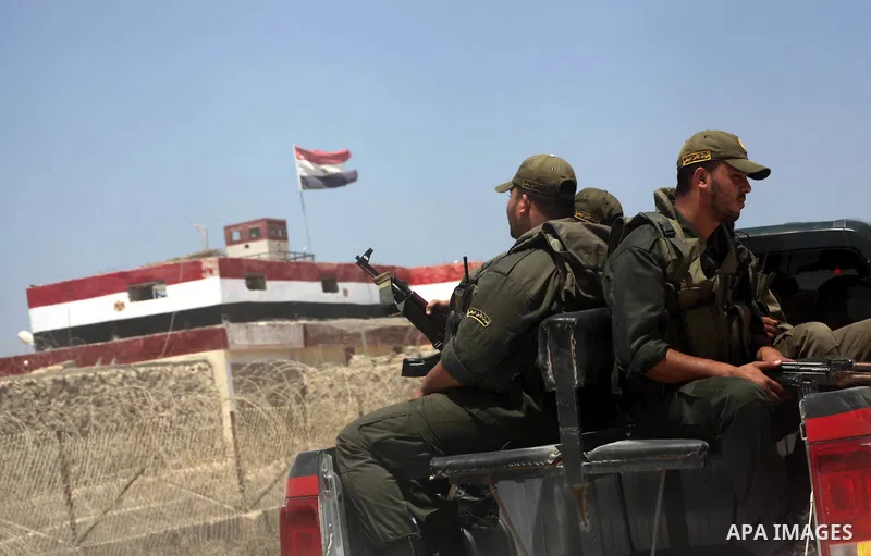 Palestinians Hamas security guard on duty on the border between Egypt and Gaza strip in Rafah town southern Gaza strip on, 06 August 2012. Reports state that at least five gunmen were killed after they tried to infiltrat...