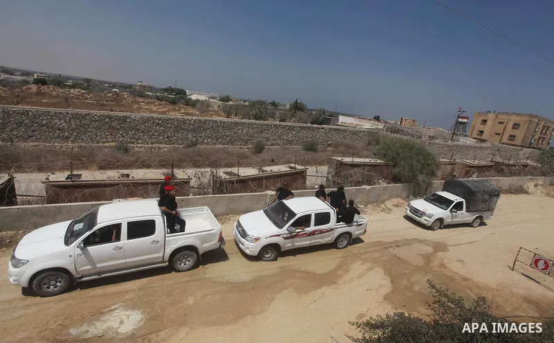 Palestinians Hamas security guard on duty on the border between Egypt and Gaza strip in Rafah town southern Gaza strip on, 06 August 2012. Reports state that at least five gunmen were killed after they tried to infiltrat...