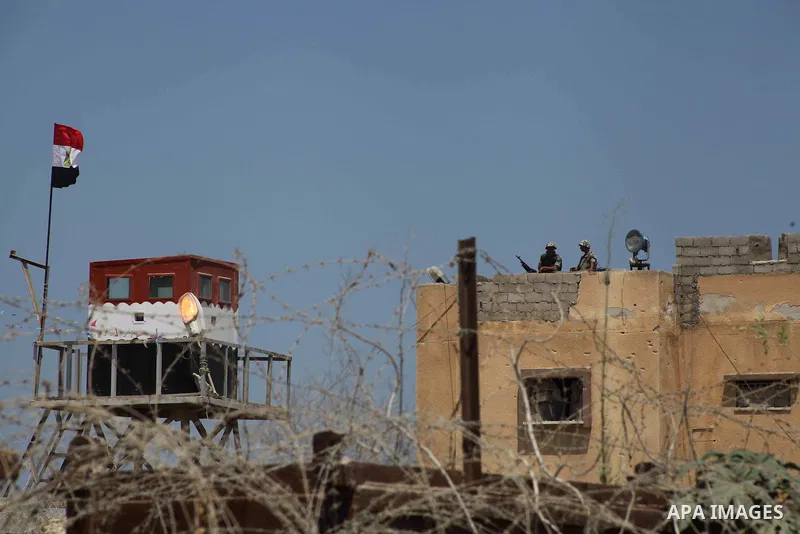 Egyptian soldiers stand guard on the border between Egypt and the southern Gaza Strip, near Rafah August 6, 2012. Egypt branded Islamist gunmen who killed 16 police near the Israeli border as "infidel" and promised on Mo...