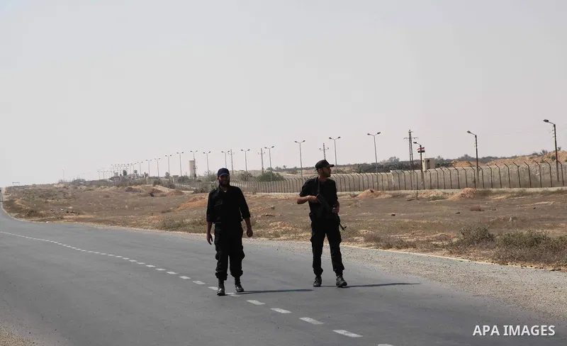 A Palestinian Hamas security guard on duty on the border between Egypt and Gaza strip in Rafah town southern Gaza strip on, 06 August 2012. Reports state that at least five gunmen were killed after they tried to infiltra...
