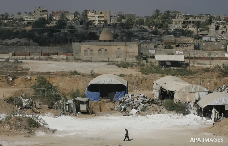 A view of the smuggling tunnels area along Egypt Gaza border is seen from Rafah, southern Gaza Strip, Monday, Aug. 6, 2012. Hamas has shut down tunnel operations after the deadly attack on Egyptian soldiers last night to...